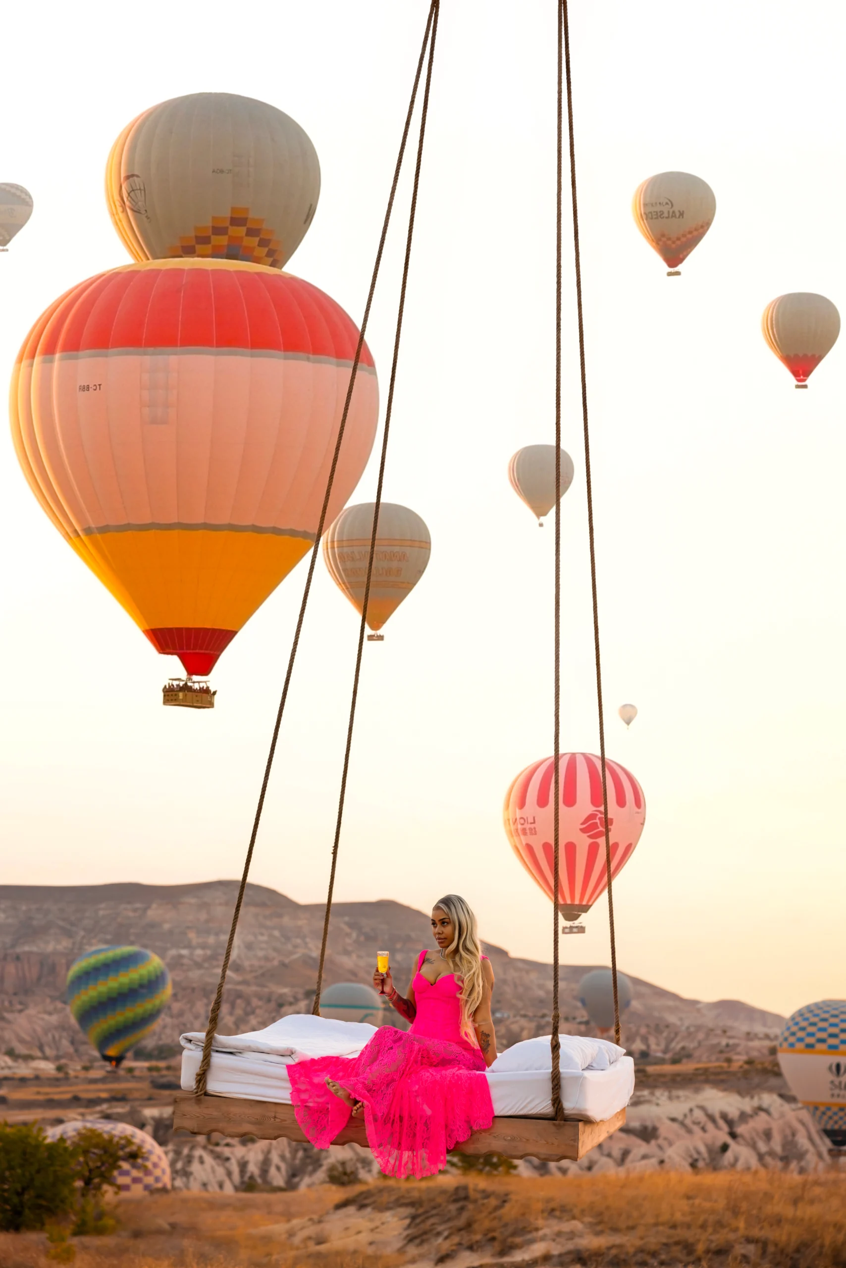 Cappadocia Bed Photoshoot: Floating Bed Experience in Fairy Landscapes 3 Floating bed Cappadocia photoshoot at sunrise